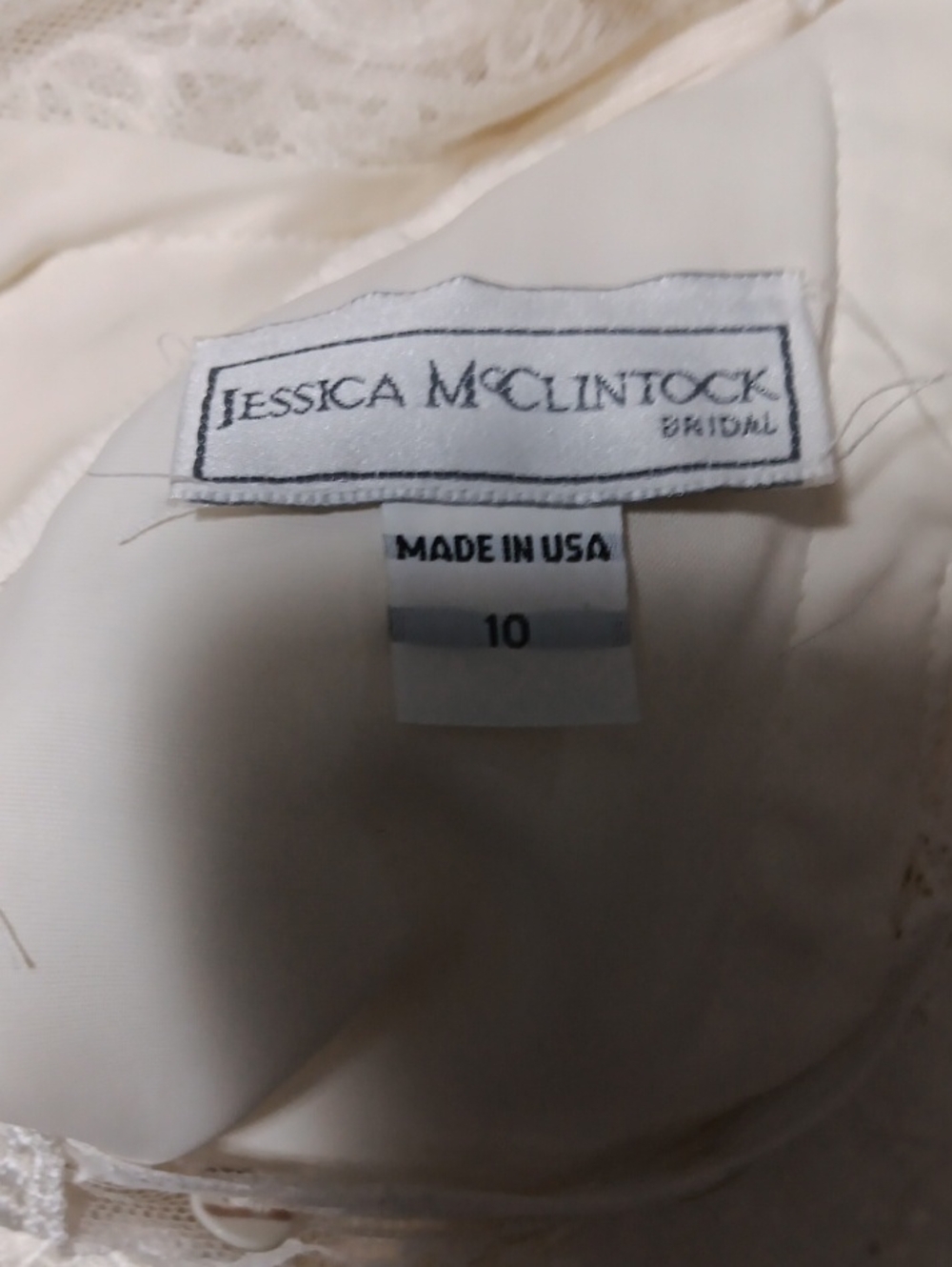 Jessica McClintock Cream Bridal Gown with Lace Trim